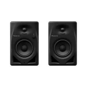 Black Pioneer DJ DM-40D 4-inch desktop monitor speakers positioned on a surface, designed for high-quality sound.