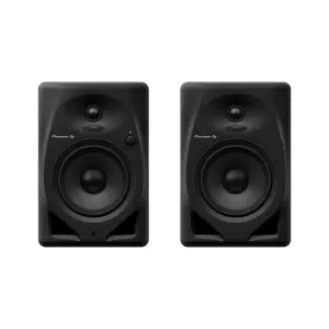 Black Pioneer DJ DM-50D 5-inch desktop monitor speakers positioned on a surface, designed for high-quality sound.