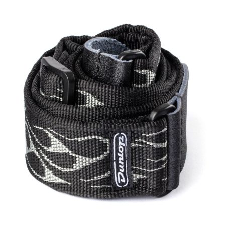 A black and white patterned guitar strap displayed against a neutral background.