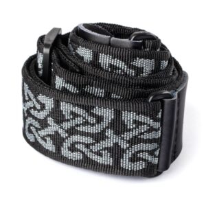 A guitar strap featuring a stylish black and grey patterned design.