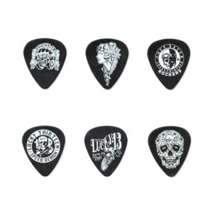 A collection of six guitar picks adorned with skull graphics, perfect for adding a bold touch to any guitarist's gear.