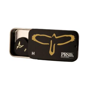 A collection of PRS T-Bird Hard Size guitar picks displayed on a surface, showcasing various colors and designs.