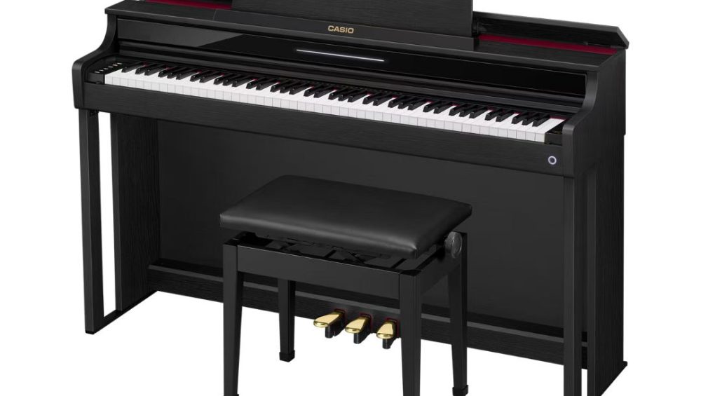 Black Casio Celviano AP-550 digital piano with bench displayed prominently, showcasing its sleek design and modern features.