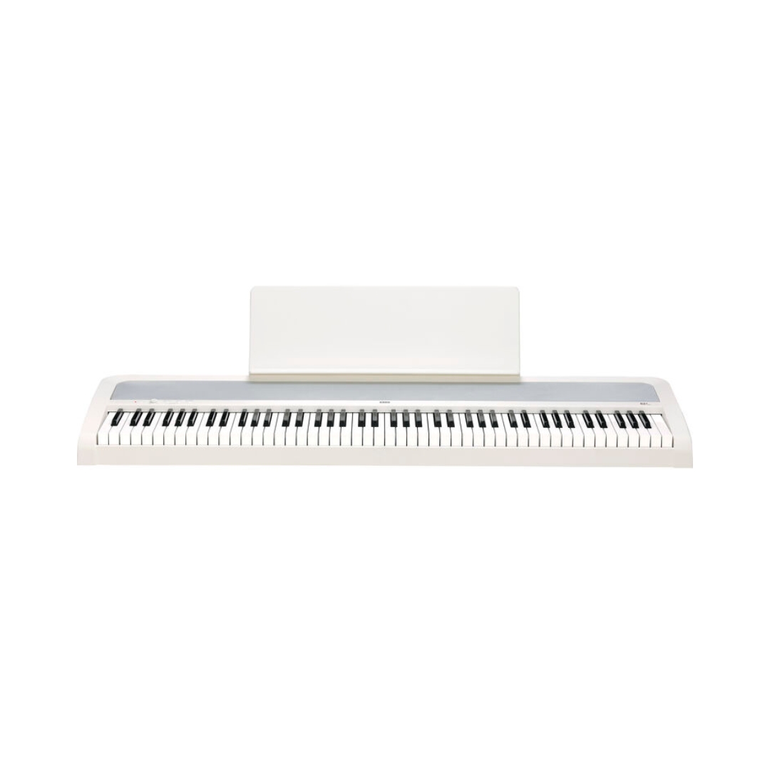 Elegant white Korg B2+ digital piano equipped with 88 hammer action keys for realistic touch and sound.
