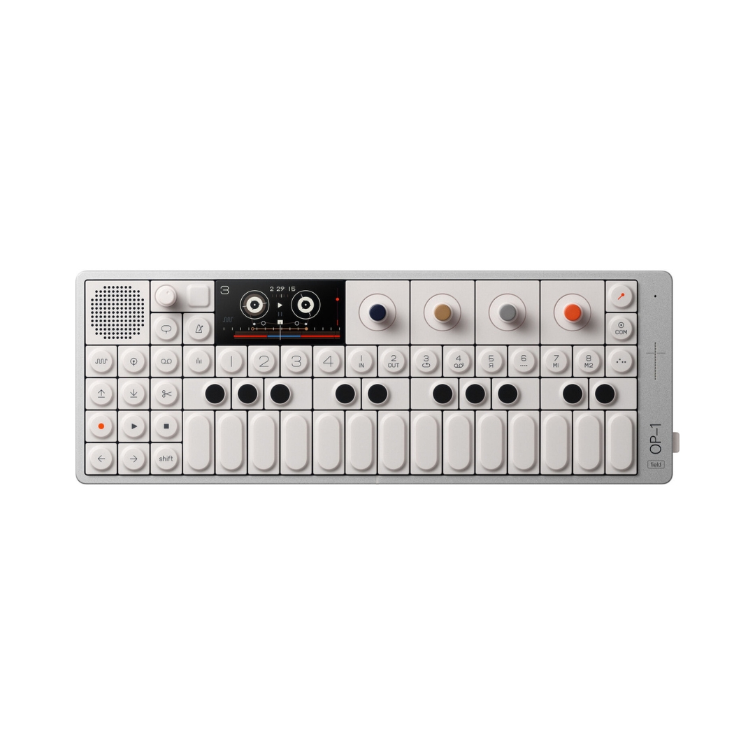 Teenage Engineering OP–1 field portable synthesizer workstation with a compact design and colorful interface for music creation.