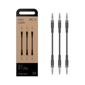 Teenage Engineering MC-3 PO mini sync cables displayed, showcasing their compact design for audio equipment connectivity.