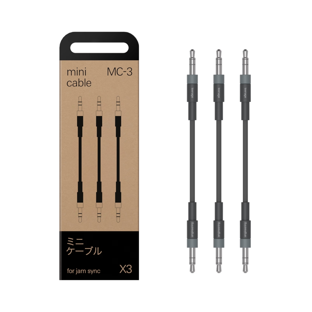 Teenage Engineering MC-3 PO mini sync cables displayed, showcasing their compact design for audio equipment connectivity.