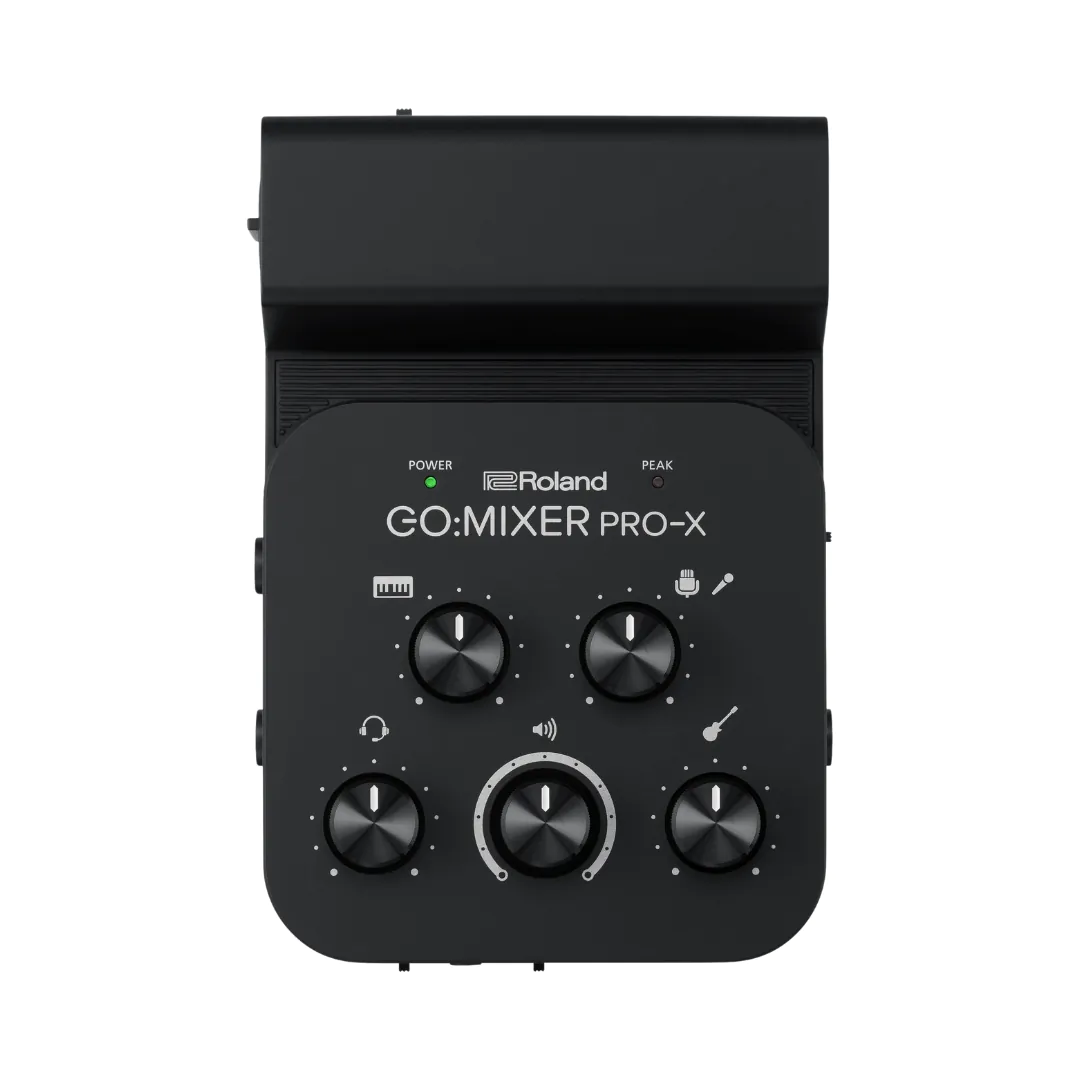 Compact audio mixer for smartphones, with various input and output options for enhanced mobile audio recording and production.